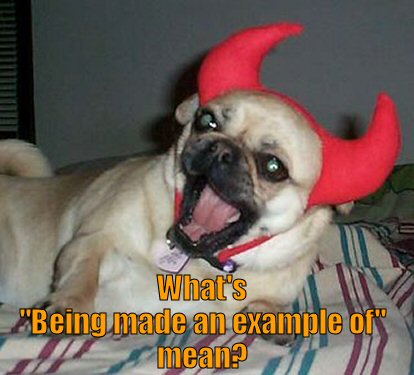 pug wearing devil horns